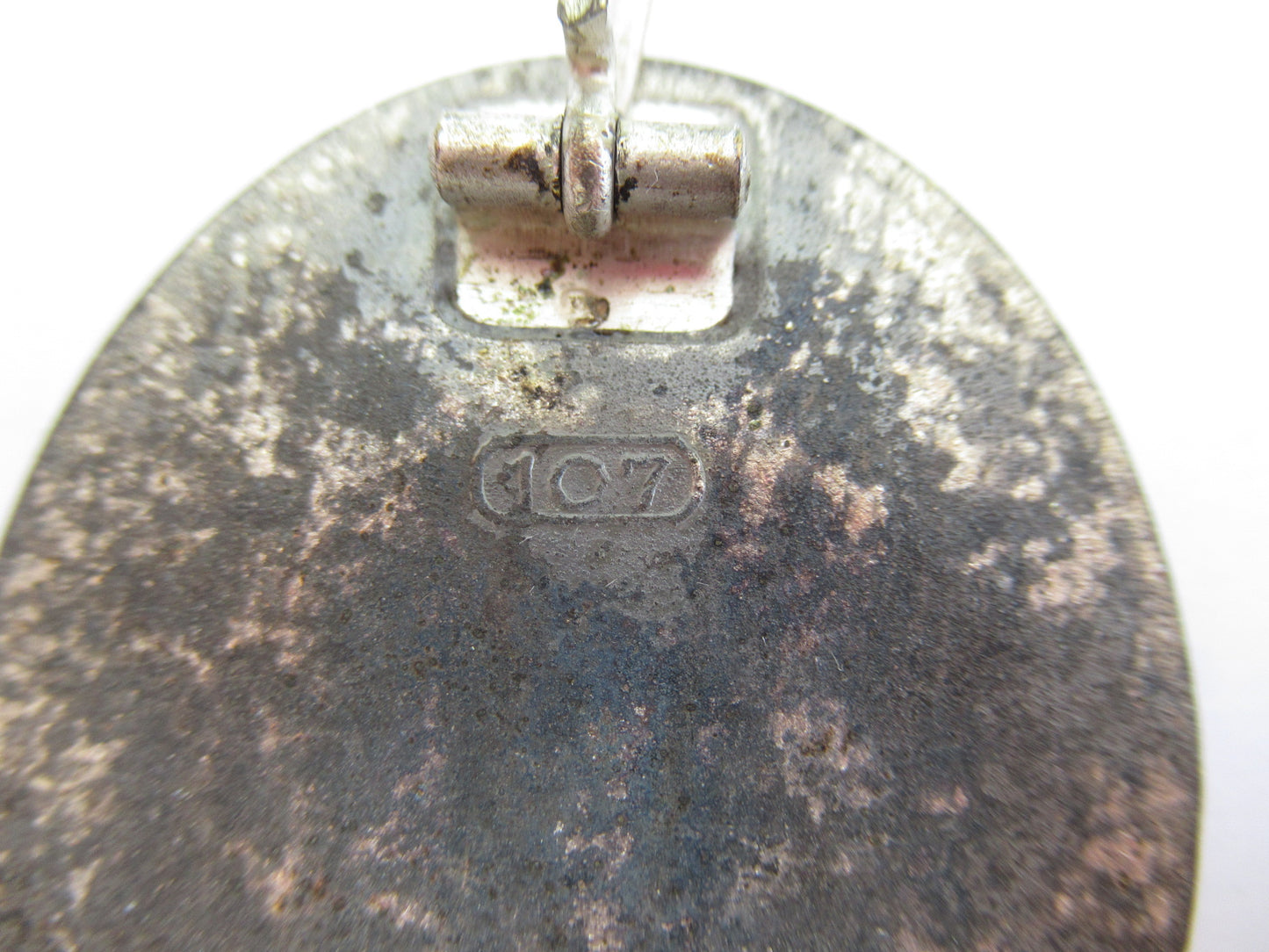 GERMANY III REICH WOUND BADGE 1939 2ND GRADE "SILVERED". SOLID BACK. MARKED "107". 4.