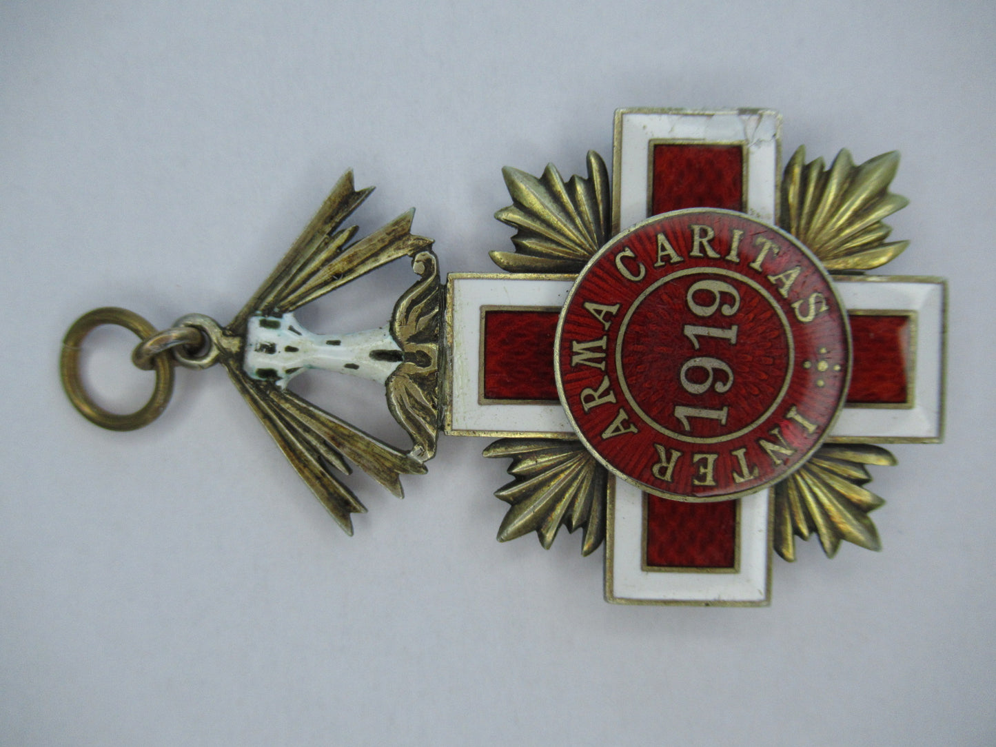 ESTONIA RED CROSS ORDER 3RD CLASS. SILVER/GILT. MISSING RIBBON. RARE VF.