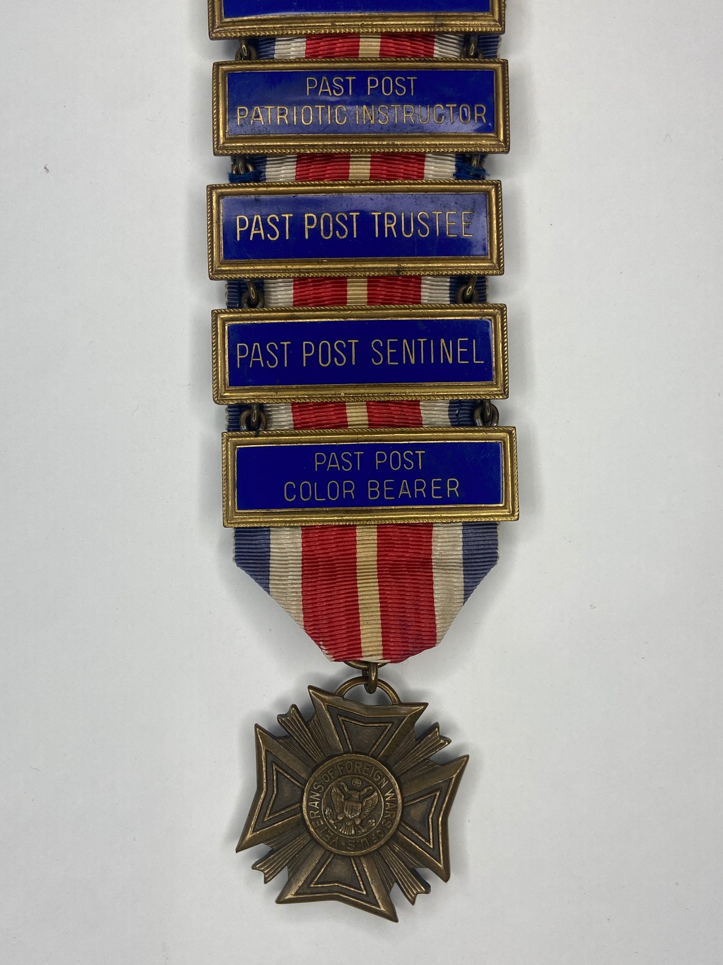 A Rare USA Veterans of Foreign Wars Membership Badge with 21 Ribbon Bars