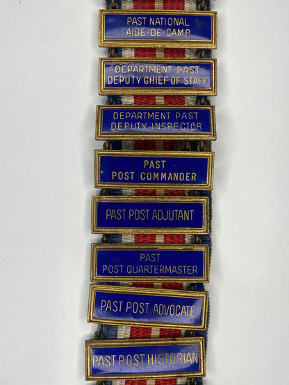 A Rare USA Veterans of Foreign Wars Membership Badge with 21 Ribbon Bars