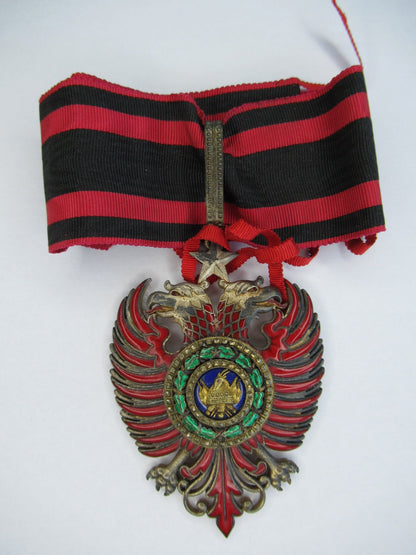 ALBANIA ORDER OF SCANDERBEG COMMANDER GRADE NECK BADGE ON ORIGINAL CRAVAT.  MADE BY CRAVANZOLA. TYPE 1.