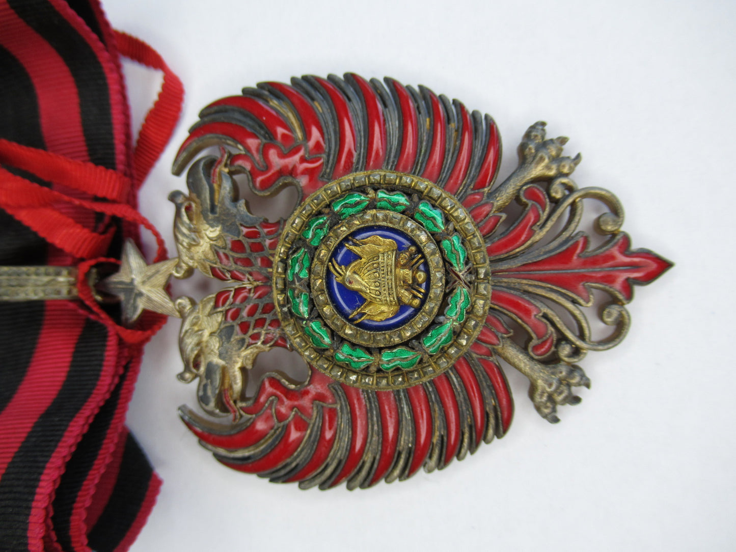 ALBANIA ORDER OF SCANDERBEG COMMANDER GRADE NECK BADGE ON ORIGINAL CRAVAT.  MADE BY CRAVANZOLA. TYPE 1.