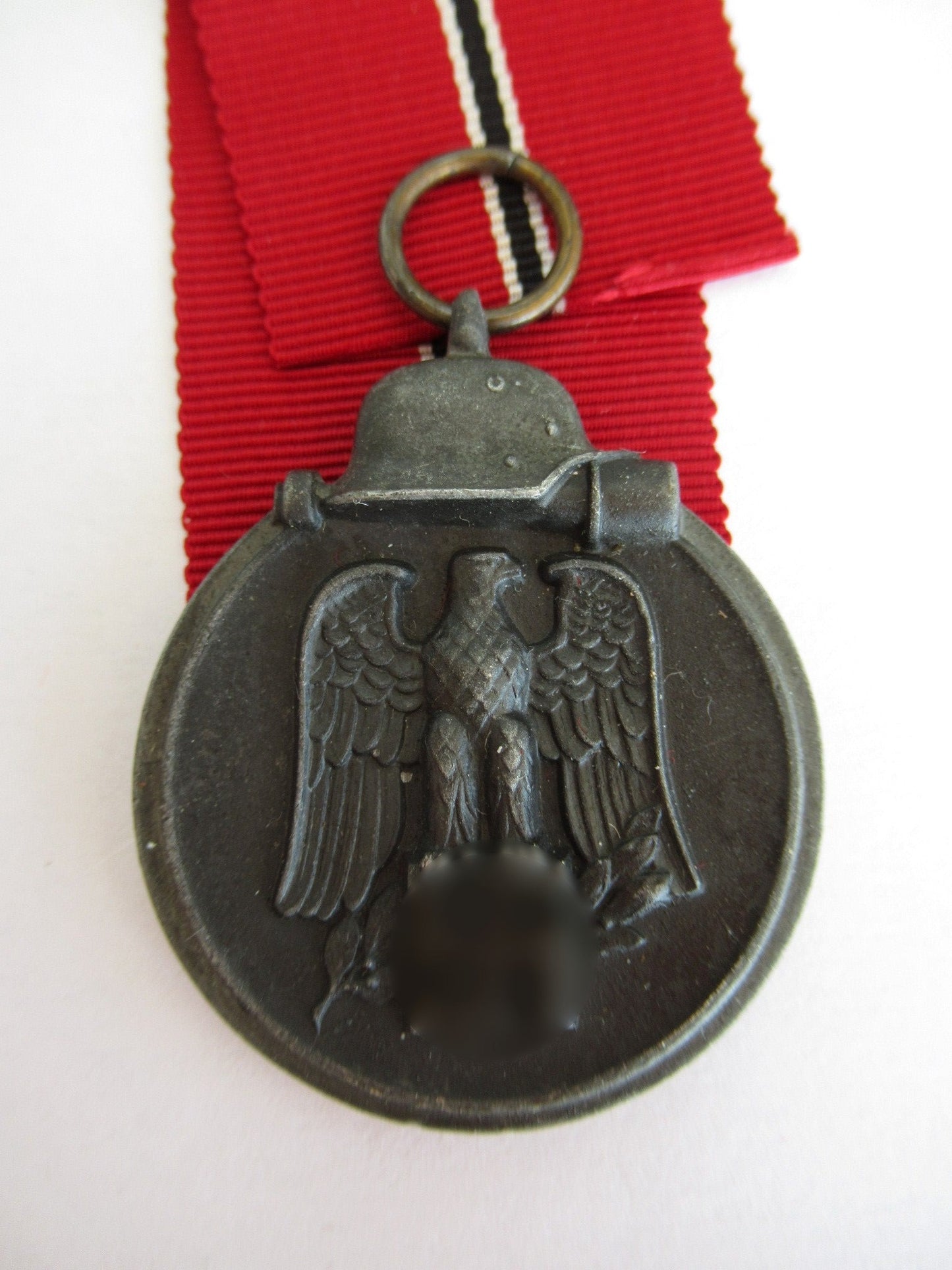 GERMANY III REICH EASTERN FRONT MEDAL. COMES WITH ORIGINAL POUCH.