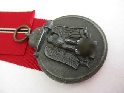 GERMANY III REICH EASTERN FRONT MEDAL. COMES WITH ORIGINAL POUCH.