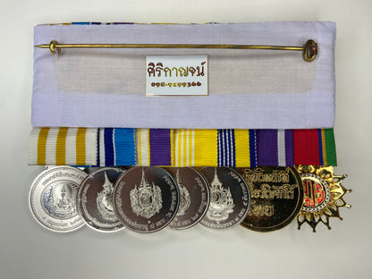 A Beautiful Modern 7 Medal Bar from Thailand