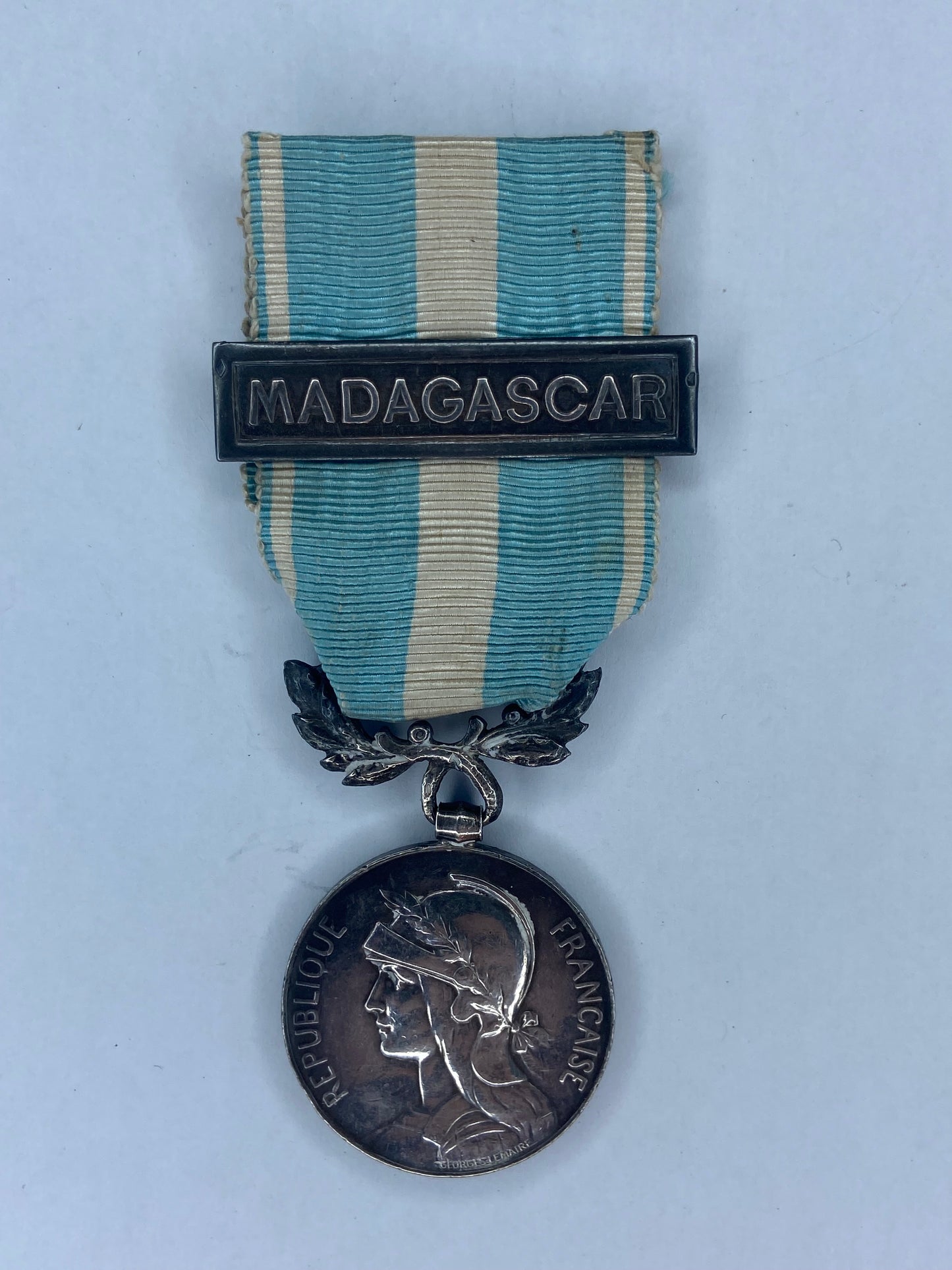 FRANCE COLONIAL MEDAL WITH MADAGASCAR BAR. SILVER. HALLMARKED.