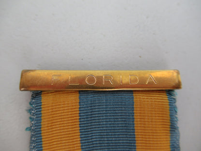 USA SOCIETY BADGE MEDAL FOR THE DAUGHTERS OF THE AMERICAN COLONIALISTS. GOLD FILLED. COMES WITH 7 NAMED RIBBON BARS AND A 'FLORIDA' TOP BAR. NAMED. NUMBERED, AND MARKED. RR!