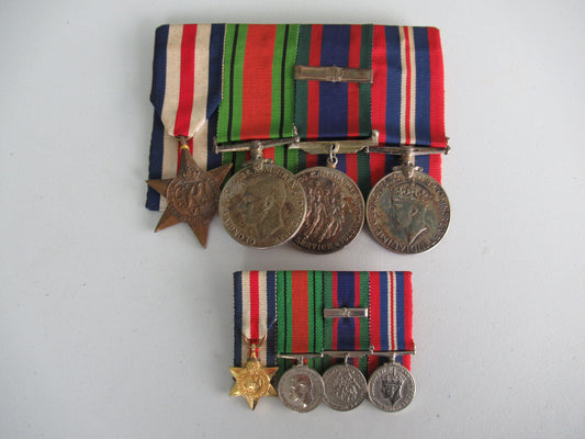 CANADA GROUP OF 4 WWII MEDALS ON MEDAL BAR. NOT NAMED.  COMES WITH GROUP OF 4 MATCHING MINIATURE MEDALS ON MEDAL BAR. 3.