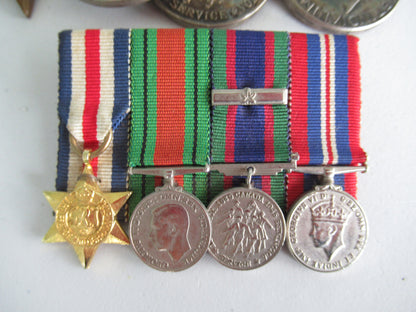 CANADA GROUP OF 4 WWII MEDALS ON MEDAL BAR. NOT NAMED.  COMES WITH GROUP OF 4 MATCHING MINIATURE MEDALS ON MEDAL BAR. 3.