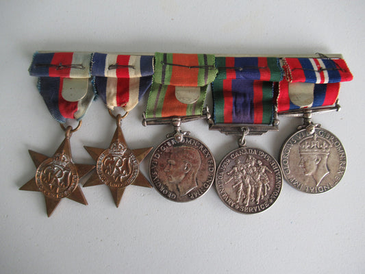 CANADA GROUP OF 5 WWII MEDALS ON MEDAL BAR. NOT NAMED. 4.