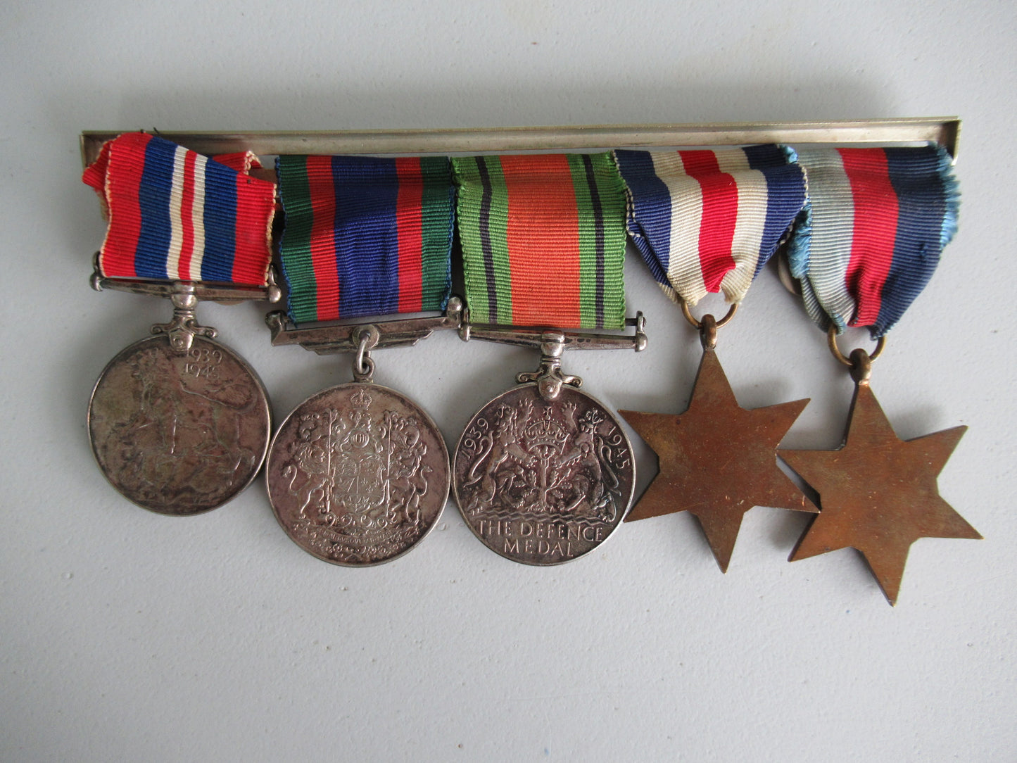 CANADA GROUP OF 5 WWII MEDALS ON MEDAL BAR. NOT NAMED. 4.