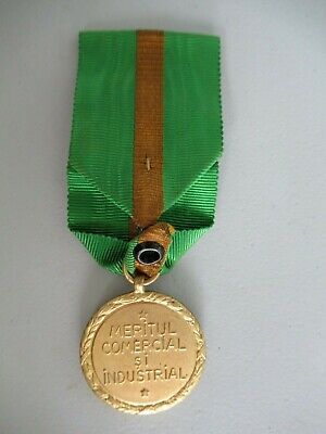 ROMANIA KINGDOM COMMERCE AND INDUSTRY MEDAL 1ST CLASS. ORIGINAL RIBBON