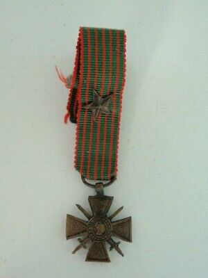 FRANCE 1914-1915 WAR CROSS MINIATURE WITH STAR ON RIBBON. VF+