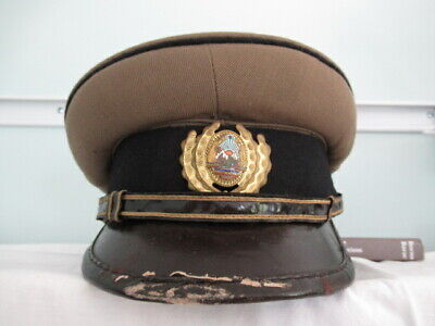 ROMANIA SOCIALIST RSR JR. OFFICER'S ARMORED VISOR HAT.  VF+ MEDAL