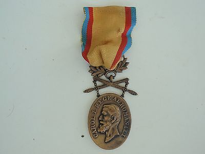 ROMANIA MANHOOD & LOYALTY MEDAL 3RD CLASS WITH SWORDS.