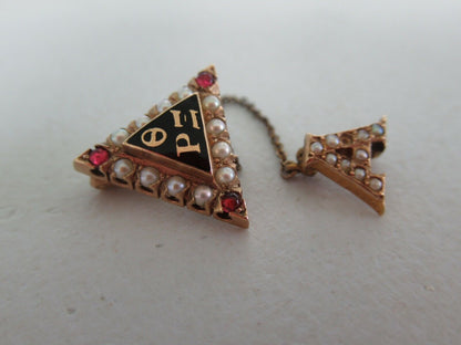 USA FRATERNITY PIN THETA RHO XI. MADE IN GOLD 10K. RUBIES. MARKED. 106