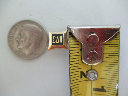 美国兄弟会 PIN SIGMA DELTA PI。 14K 金制成。已标记。 708