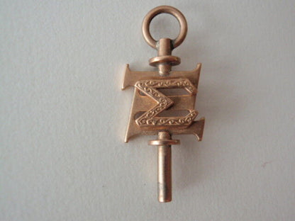 USA FRATERNITY PIN SIGMA KEY. MADE IN GOLD. 1938. CORNELL. NAMED. 209