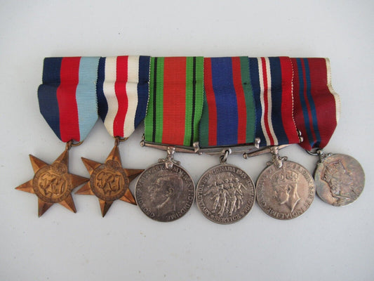 CANADA WWII MEDAL BAR WITH 6 MEDALS. NOT NAMED. RARE.